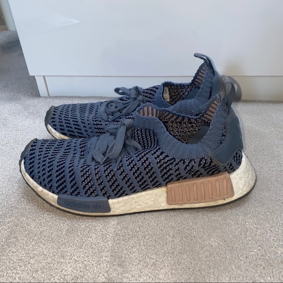 white nmds with blue